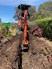 Mini excavator digging trenches Melbourne